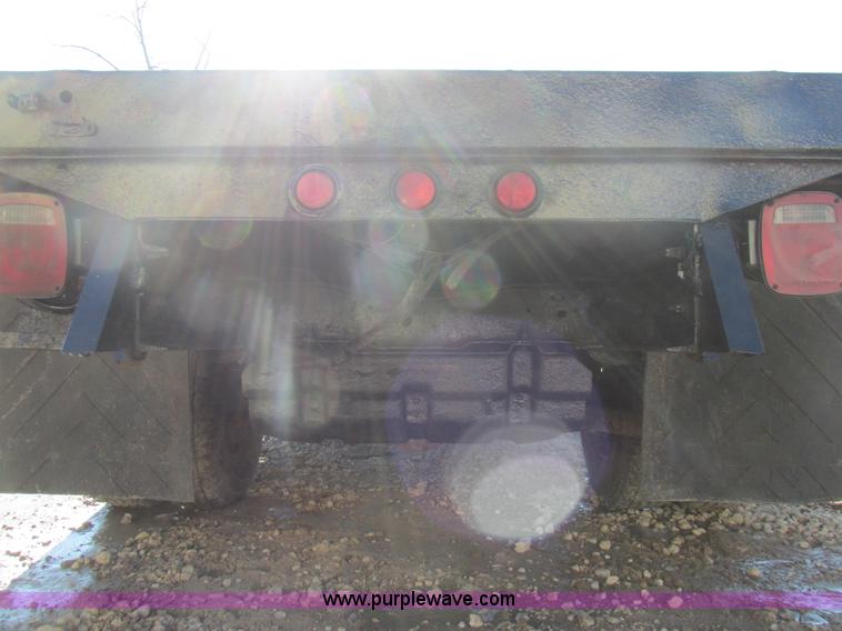 image for item H7613 1999 Ford F350 Super Duty XL flatbed pickup truck