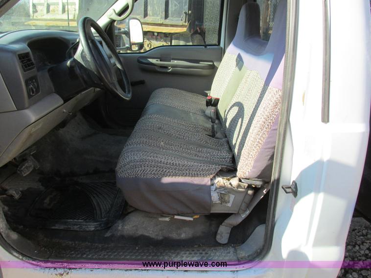 image for item H7613 1999 Ford F350 Super Duty XL flatbed pickup truck