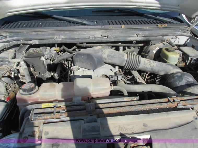 image for item H7613 1999 Ford F350 Super Duty XL flatbed pickup truck