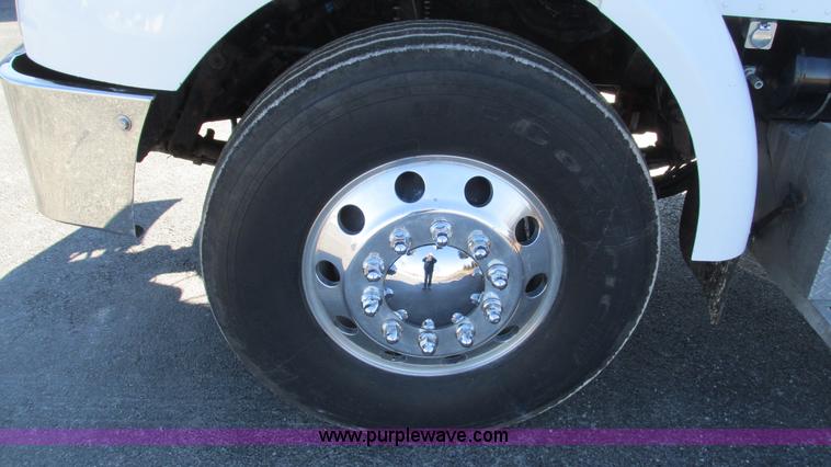 image for item I3111 2003 Peterbilt PB330 dump truck