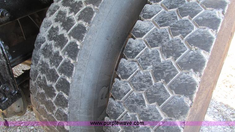 image for item I3111 2003 Peterbilt PB330 dump truck