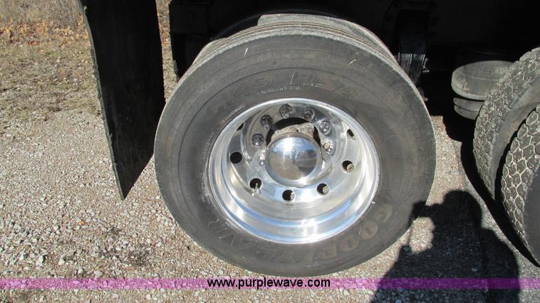 image for item I3111 2003 Peterbilt PB330 dump truck