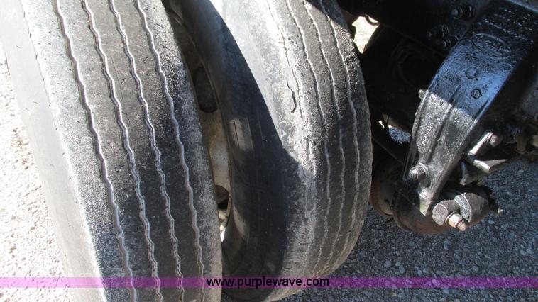 image for item I3111 2003 Peterbilt PB330 dump truck