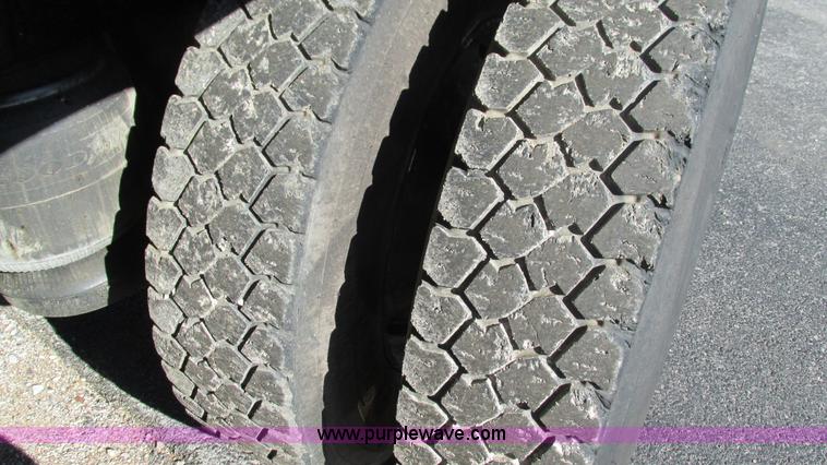 image for item I3111 2003 Peterbilt PB330 dump truck