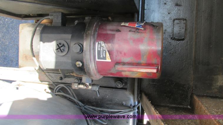 image for item I3111 2003 Peterbilt PB330 dump truck