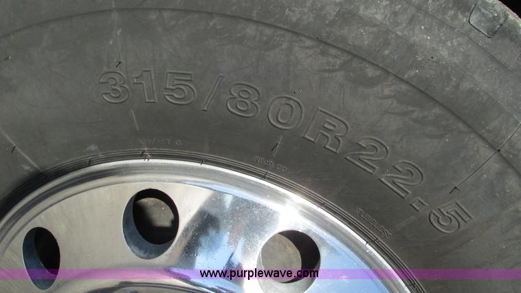 image for item I3111 2003 Peterbilt PB330 dump truck