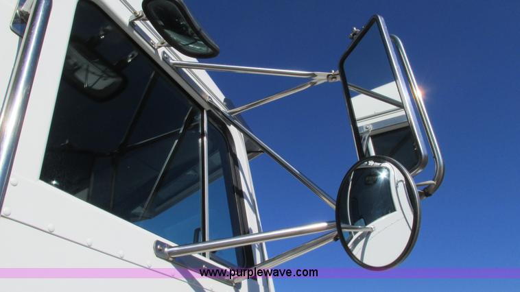 image for item I3111 2003 Peterbilt PB330 dump truck