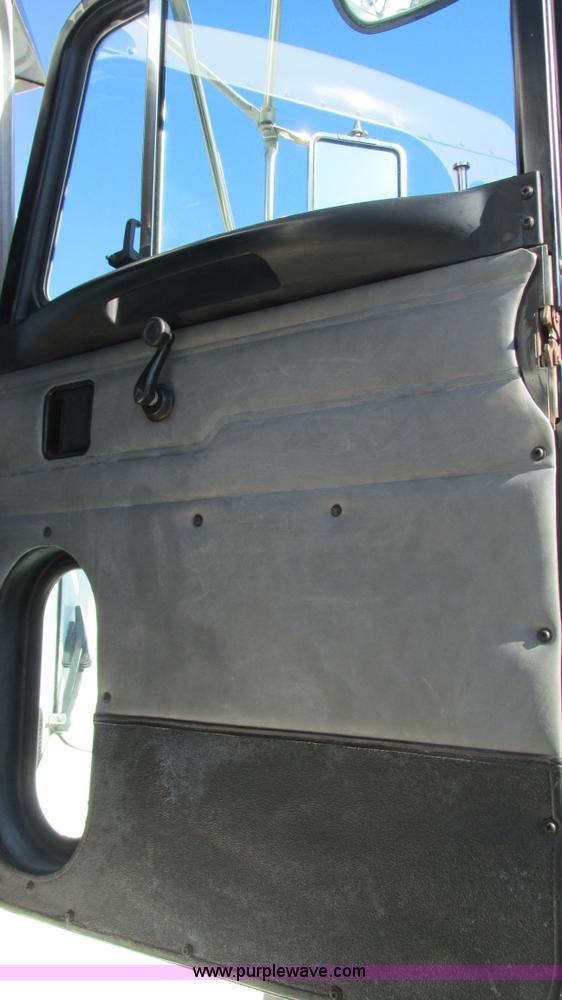 image for item I3111 2003 Peterbilt PB330 dump truck