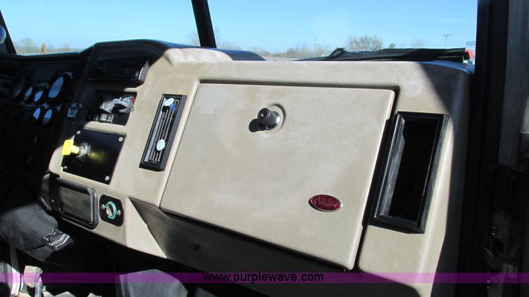 image for item I3111 2003 Peterbilt PB330 dump truck