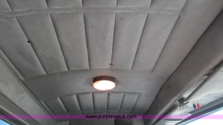 image for item I3111 2003 Peterbilt PB330 dump truck