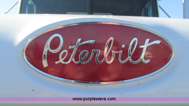 image for item I3111 2003 Peterbilt PB330 dump truck