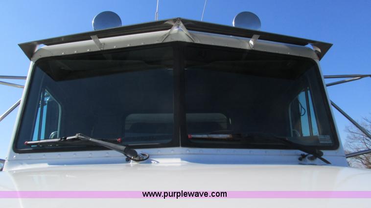 image for item I3111 2003 Peterbilt PB330 dump truck