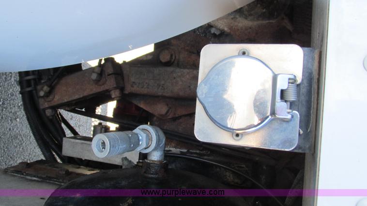 image for item I3111 2003 Peterbilt PB330 dump truck