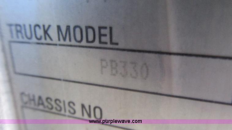 image for item I3111 2003 Peterbilt PB330 dump truck