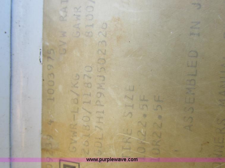 image for item I8769 1991 GMC TopKick flatbed truck