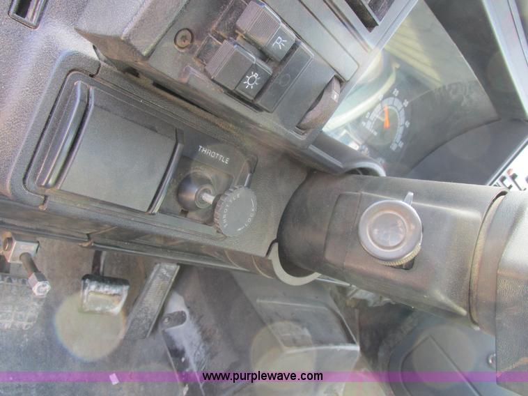 image for item I8769 1991 GMC TopKick flatbed truck