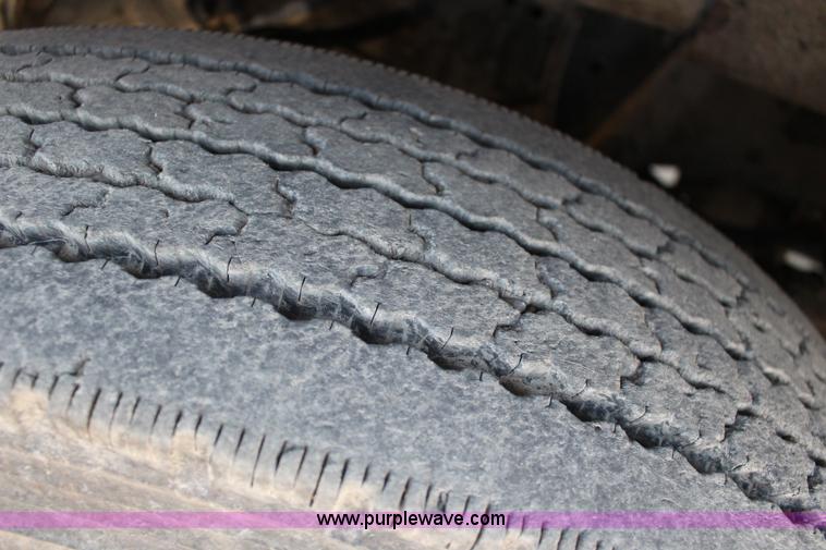 image for item L6577 1999 International 4700 oil distribution truck