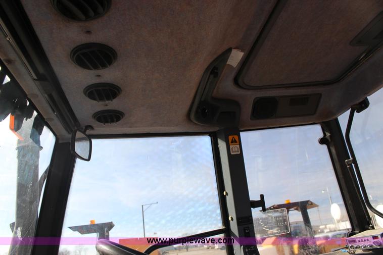 image for item L6585 1998 New Holland TS100 tractor