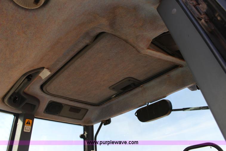 image for item L6585 1998 New Holland TS100 tractor