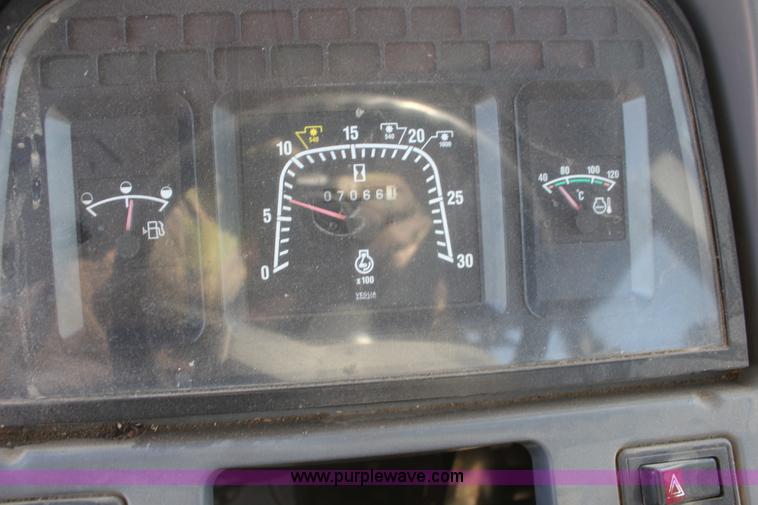 image for item L6585 1998 New Holland TS100 tractor