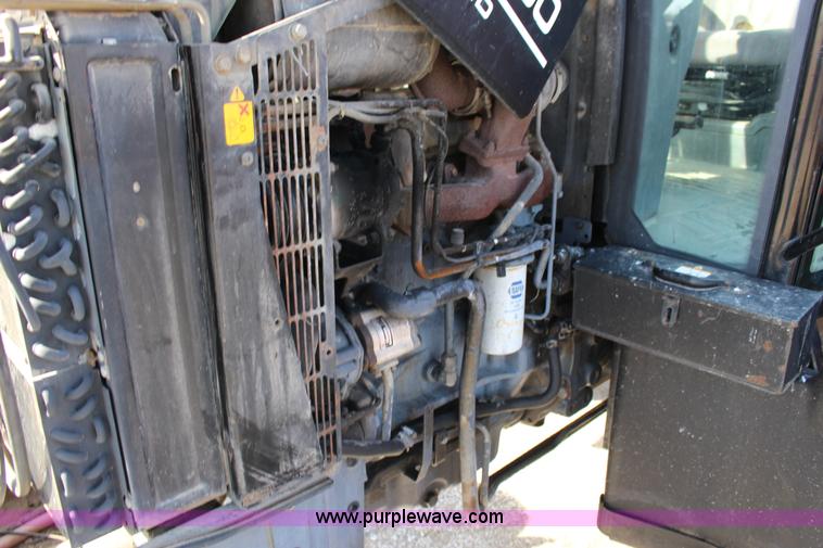 image for item L6585 1998 New Holland TS100 tractor