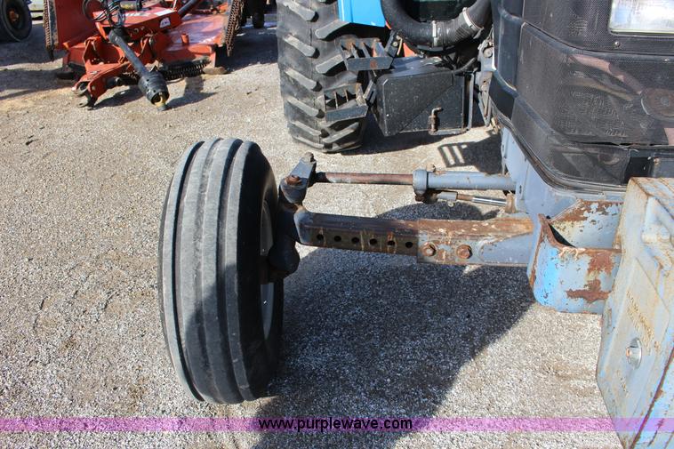 image for item L6585 1998 New Holland TS100 tractor