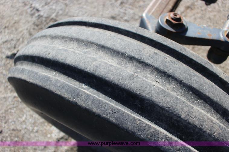 image for item L6585 1998 New Holland TS100 tractor