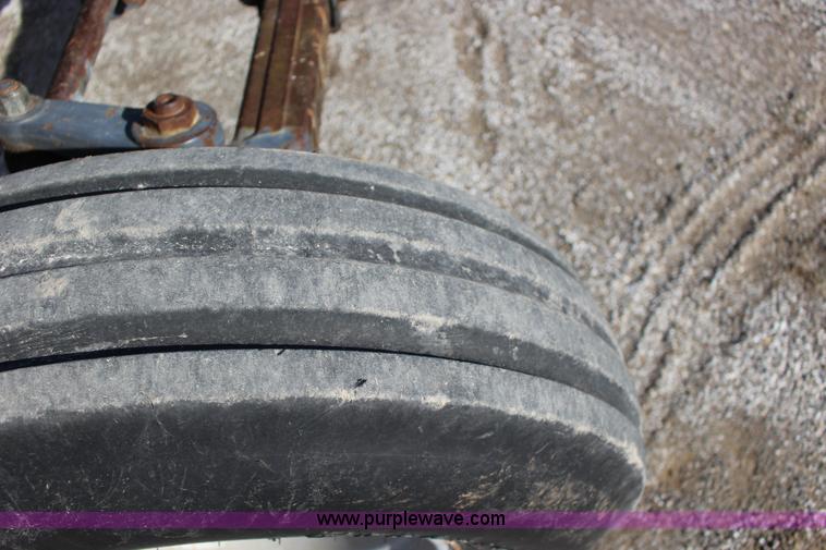 image for item L6585 1998 New Holland TS100 tractor