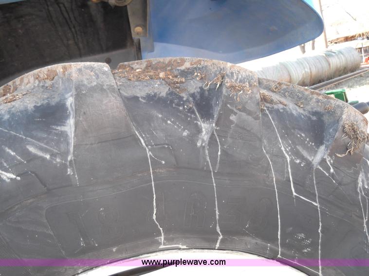 image for item D1383 2007 New Holland TM130 MFWD tractor