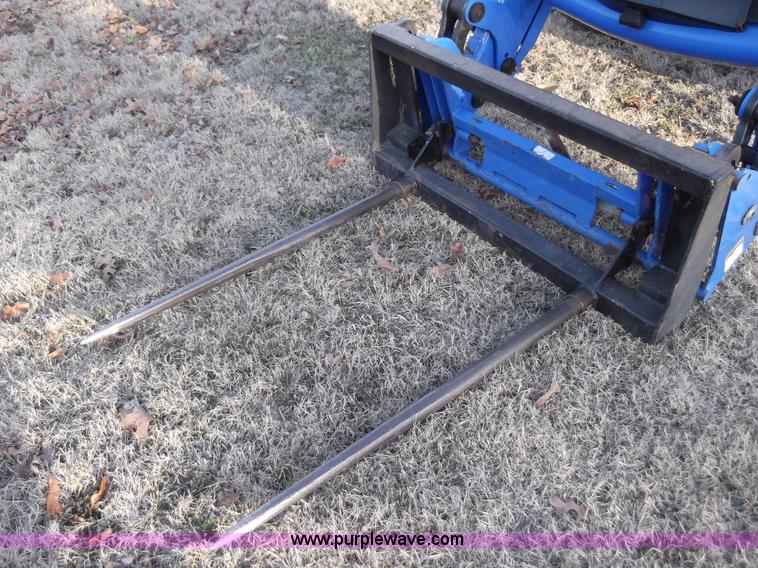 image for item D1383 2007 New Holland TM130 MFWD tractor