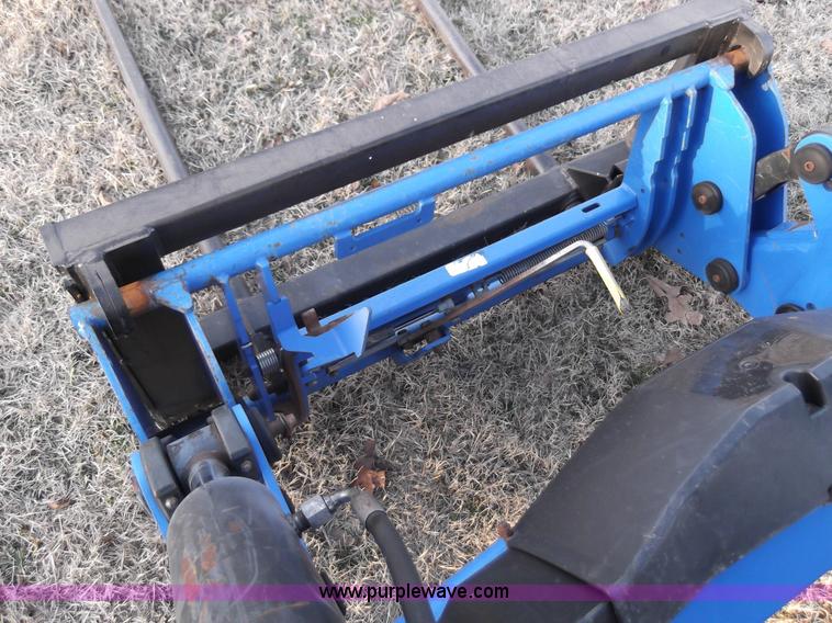 image for item D1383 2007 New Holland TM130 MFWD tractor