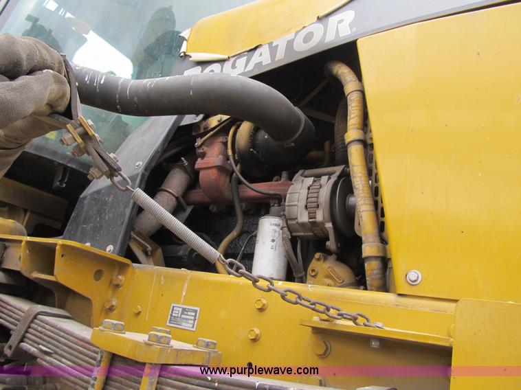 image for item F8900 2002 Ag-Chem RoGator 854 self-propelled sprayer