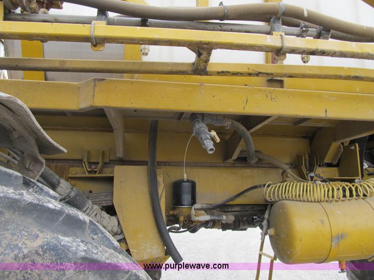 image for item F8900 2002 Ag-Chem RoGator 854 self-propelled sprayer