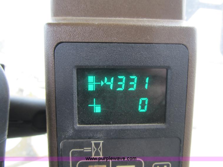 image for item F8900 2002 Ag-Chem RoGator 854 self-propelled sprayer