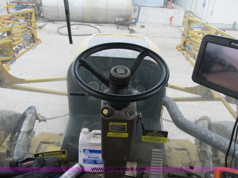 image for item F8900 2002 Ag-Chem RoGator 854 self-propelled sprayer