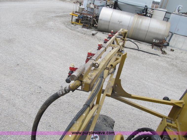 image for item F8900 2002 Ag-Chem RoGator 854 self-propelled sprayer