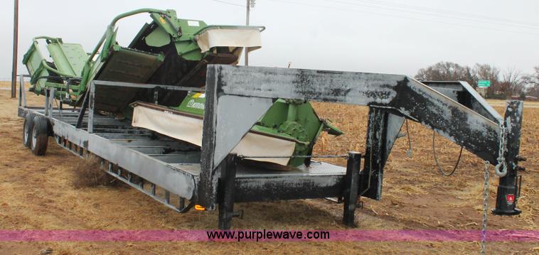 image for item H1630 (2) 2005 Krone disc mower windrowers with shop built trailer