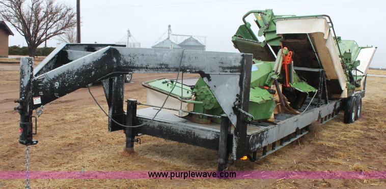 image for item H1630 (2) 2005 Krone disc mower windrowers with shop built trailer