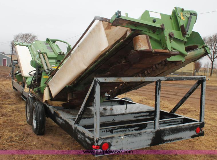 image for item H1630 (2) 2005 Krone disc mower windrowers with shop built trailer