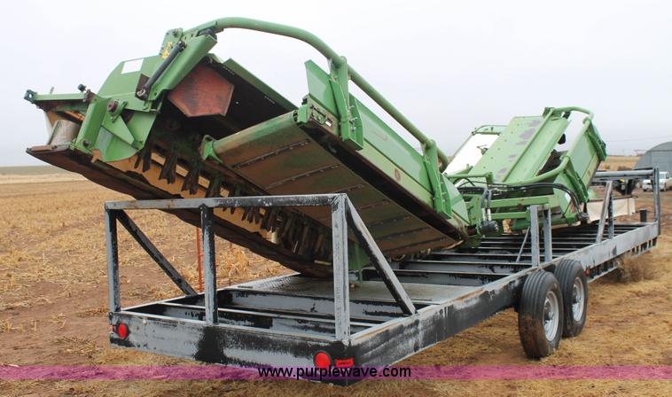 image for item H1630 (2) 2005 Krone disc mower windrowers with shop built trailer