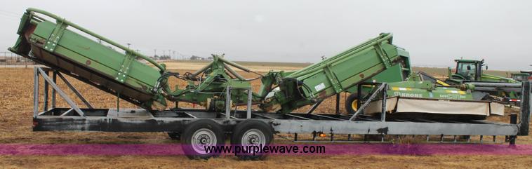 image for item H1630 (2) 2005 Krone disc mower windrowers with shop built trailer