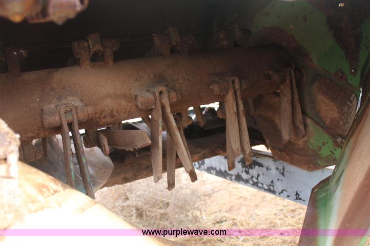 image for item H1630 (2) 2005 Krone disc mower windrowers with shop built trailer