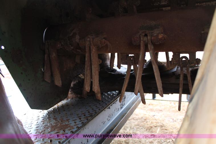 image for item H1630 (2) 2005 Krone disc mower windrowers with shop built trailer