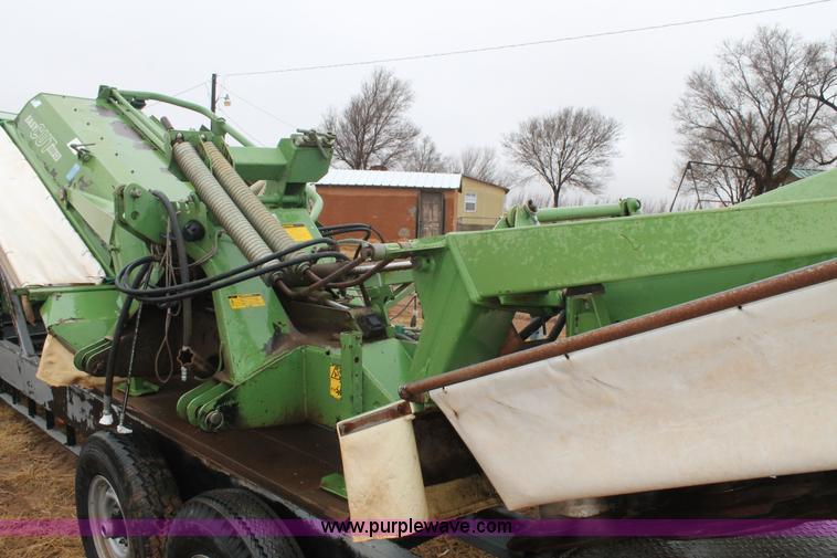 image for item H1630 (2) 2005 Krone disc mower windrowers with shop built trailer