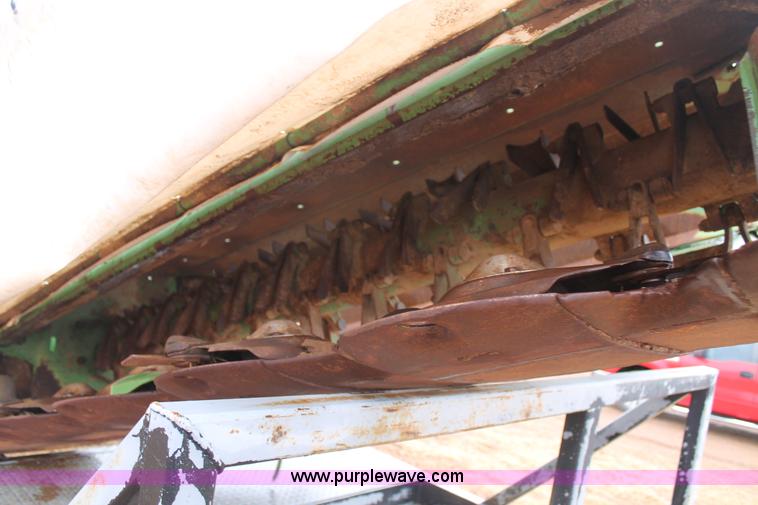 image for item H1630 (2) 2005 Krone disc mower windrowers with shop built trailer