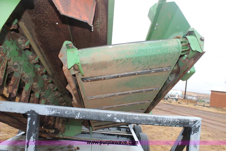 image for item H1630 (2) 2005 Krone disc mower windrowers with shop built trailer