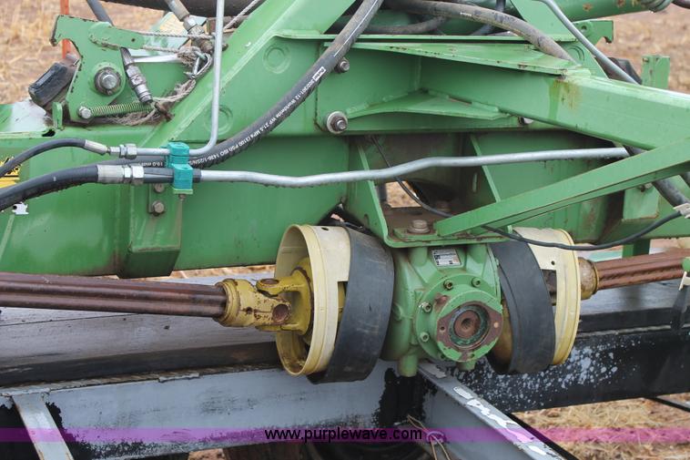 image for item H1630 (2) 2005 Krone disc mower windrowers with shop built trailer