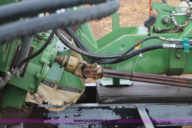 image for item H1630 (2) 2005 Krone disc mower windrowers with shop built trailer