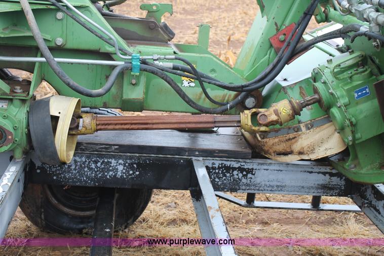 image for item H1630 (2) 2005 Krone disc mower windrowers with shop built trailer