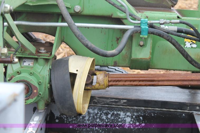 image for item H1630 (2) 2005 Krone disc mower windrowers with shop built trailer